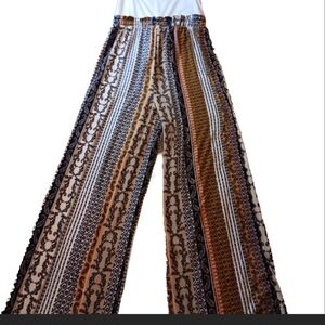 Boho print wide leg pants with drawstring waist. onepiece / jumpsuit. flared leg